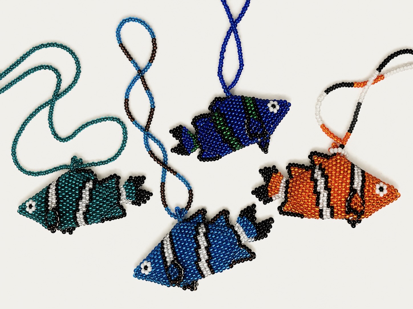 Peces artesanales en mostacilla